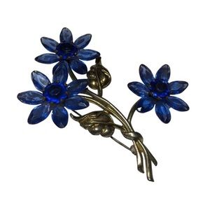 Vintage blue rhinestone gold flower brooch
